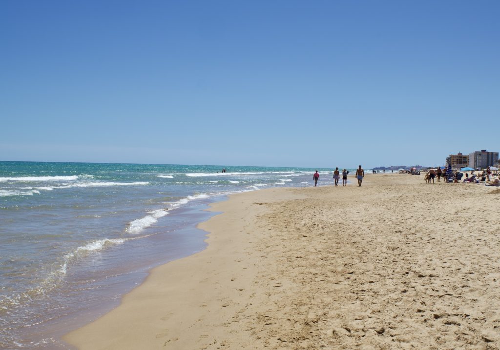 Costa Blanca beach with parasols