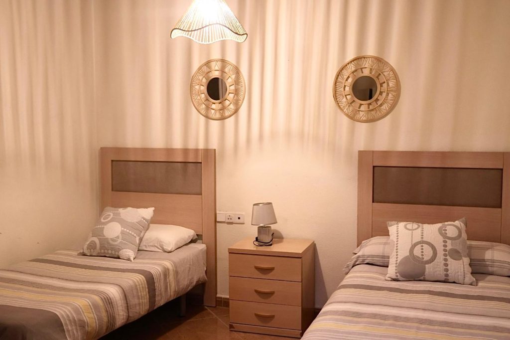 Twin bedroom with two single beds